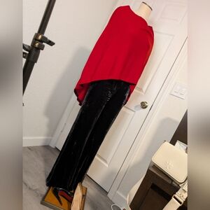 ST.JOHN red wool poncho with black inside framing. Size P/S